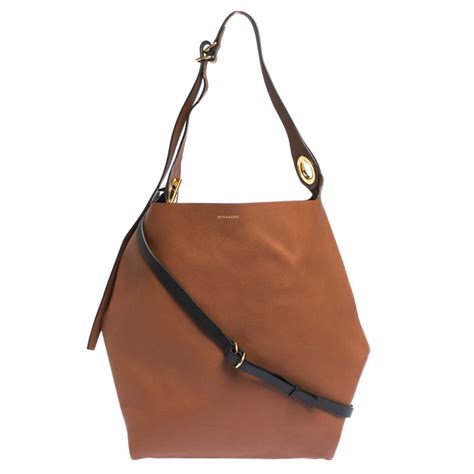 grommet medium leather hobo burberry|Burberry Tan Grommet Medium Leather Hobo .